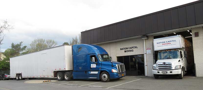 These are two of our moving trucks in front of our storage facility.